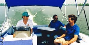 doug driving pontoon boat